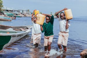 boys collecting water